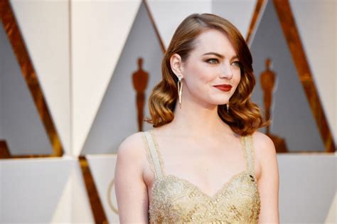 Emma Stone Goes Glam in Gold Givenchy at the Oscars 